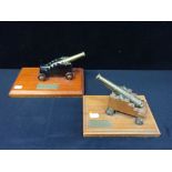 TWO BRASS MODEL CANNON, ON WOODEN CARRIAGES