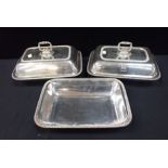 A PAIR OF SILVER PLATED COVERED SERVING DISHES
