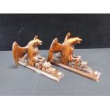 A PAIR OF JAPANESE WOOD CARVINGS OF EAGLES IN FLIGHT