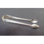 A PAIR OF SILVER SUGAR TONGS