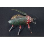 A LEHMANN CLOCKWORK TINPLATE BEETLE TOY