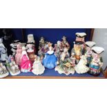 A COLLECTION OF CAPODIMONTE FIGURINES