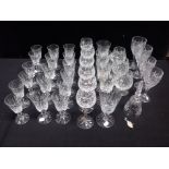 A COLLECTION OF CUT GLASS DRINKING GLASSES