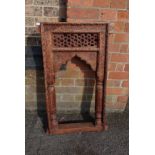 AN INDIAN HARDWOOD WINDOW FRAME