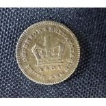 A COUNTERFEIT THIRD GUINEA, OR SEVEN SHILLING PIECE