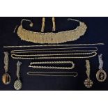 A COLLECTION OF GOLD-PLATED AND YELLOW METAL JEWELLERY
