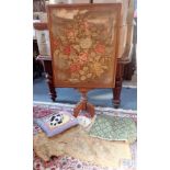 A VICTORIAN WOOL WORK FIRESCREEN