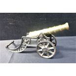 A BRASS AND CAST IRON MODEL CANON