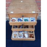 A COLLECTION OF MINERALOGICAL SPECIMENS, CONTAINED IN AN EIGHT-DRAWER PINE CABINET