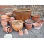 A GROUP OF TERRACOTTA FLOWERPOTS