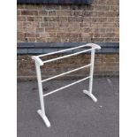 AN EDWARDIAN WHITE PAINTED TOWEL AIRER