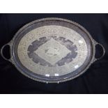 A SILVER PLATED SERVING TRAY