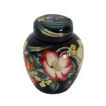 A GOLDEN JUBILEE MOORCROFT VASE AND COVER