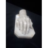 A 19TH CENTURY CARVED MARBLE HAND