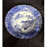 A JAPANESE PORCELAIN BLUE AND WHITE CHARGER