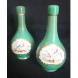 A PAIR OF BOTTLE VASES PAINTED WITH EXOTIC BIRDS