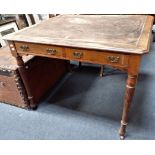 A LATE 19TH CENTURY OAK LIBRARY WRITING TABLE