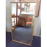 A 19TH CENTURY GILT RECTANGULAR WALL MIRROR