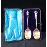 A CASED PAIR OF ATKIN BROS SERVING SPOONS