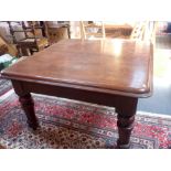 A VICTORIAN MAHOGANY EXTENDING DINING TABLE