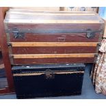 A CANVAS AND WOOD-BOUND DOMED TOP TRAVELLING TRUNK