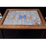 A BUTTERLY WING DECORATED COFFEE TABLE