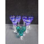 A SET OF BLUE BOHEMIAN WINE GLASSES
