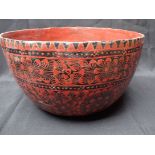 AN EASTERN RED PAINTED LACQUER BOWL