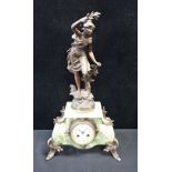 AN ONYX AND SPELTER FIGURAL CLOCK