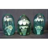 THREE VICTORIAN CASTLEFORD TYPE GLASS DUMPS WITH FLORAL INCLUSIONS