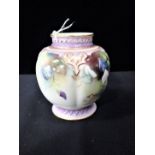 A ROYAL WORCESTER POT DECORATED WITH SWEET PEAS
