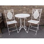 A LATTICE-WORK METAL GARDEN TABLE AND TWO CHAIRS