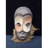 AN AFRICAN TRIBAL MASK