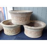 A SET OF THREE 'WILLOWSTONE' GARDEN PLANTERS