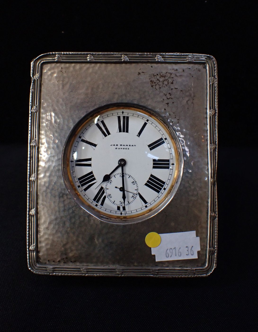 A SILVER-FRONTED GOLIATH WATCH HOLDER