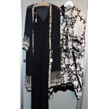 A BLACK AND WHITE EMBROIDERED GOWN