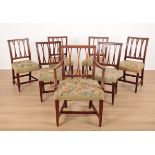 A PART SET OF SEVEN GEORGE III MAHOGANY 'X' SPLAT DINING CHAIRS