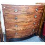 A GEORGE IV FIGURED MAHOGANY BOWFRONT CHEST OF DRAWERS