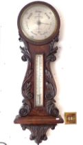 A ROSEWOOD CASED BAROMETER BY C.W. DIXEY