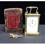 A BRASS-CASED FRENCH CARRIAGE CLOCK