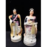 A PAIR OF STAFFORDSHIRE FIGURES: VICTORIA AND ALBERT