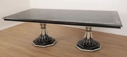 AN ITALIAN EBONISED AND WHITE-PAINTED DINING TABLE