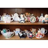 A COLLECTION OF MODERN NOVELTY TEAPOTS