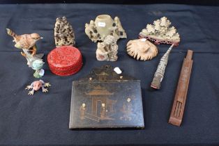 A COLLECTION OF SOAPSTONE CARVINGS