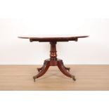 A REGENCY FIGURED MAHOGANY CIRCULAR BREAKFAST TABLE