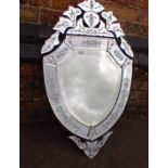 A REPRODUCTION VENETIAN WALL MIRROR