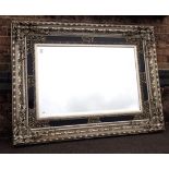 A LARGE ROCOCO STYLE WALL MIRROR