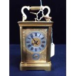 A BRASS-CASED FRENCH CARRIAGE CLOCK, WITH REPEAT AND ALARM