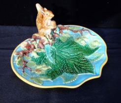 A GEORGE JONES MAJOLICA NUT DISH, WITH SQUIRREL HANDLE