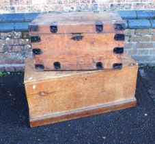 A VICTORIAN PINE TRUNK, LINED WITH OLD WALLPAPER